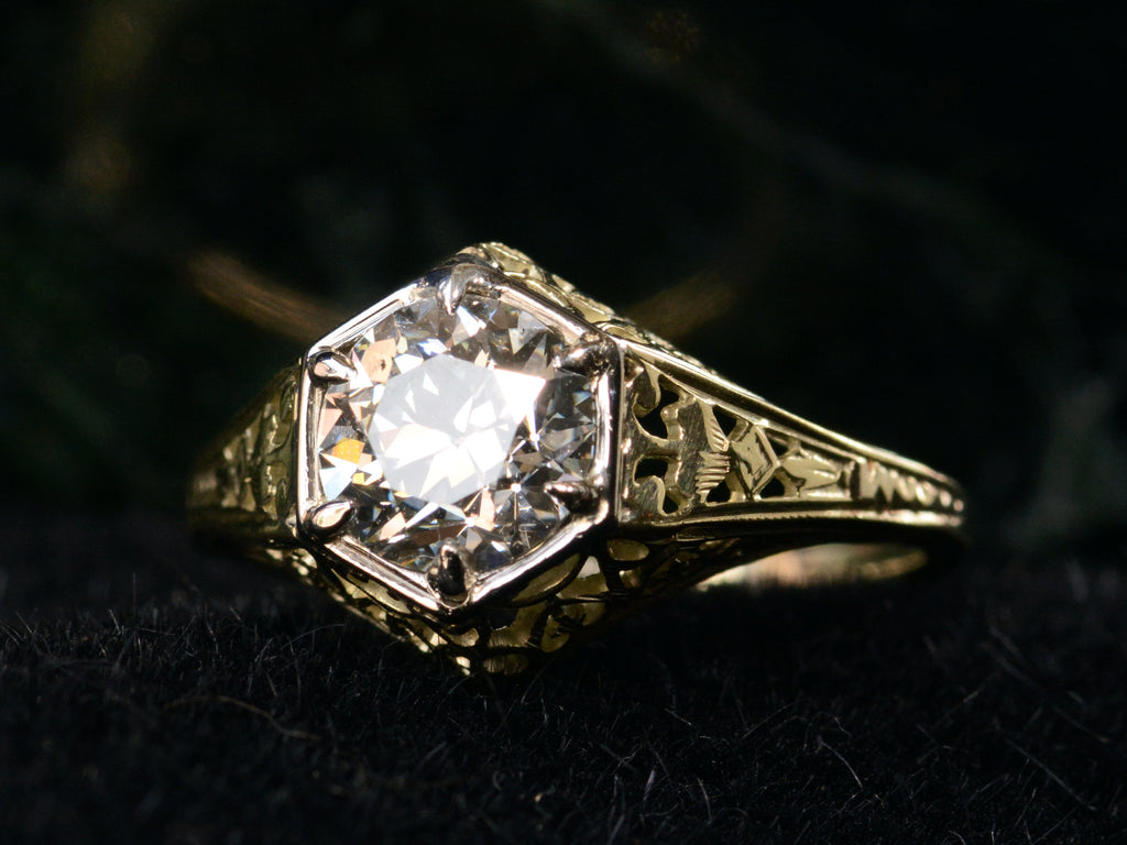 c1920 0.94ct Diamond Hexagonal Filigree Ring (angled front profile on black background)