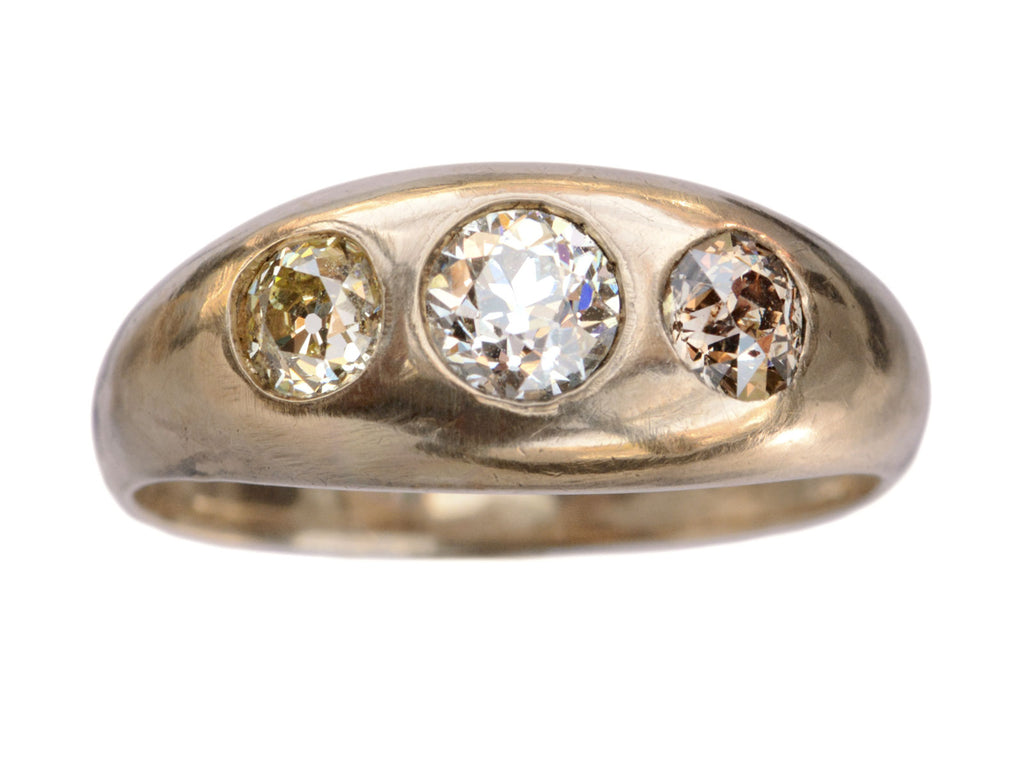 c1890 Victorian Gypsy Ring with a white diamond center and a light yellow and brown diamond on either side in rosy 10k mounting.