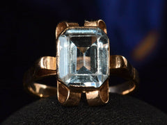 thumbnail of c1920 Art Deco Aquamarine and Rose Gold Ring (on dark background)