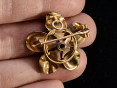 thumbnail of c1890 Black Flower Brooch (backside on hand)