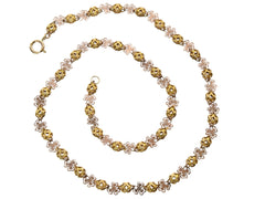 thumbnail of A Victorian c1880 Filigreed Rose and Yellow Gold Chain (shown spiraled on a white background)
