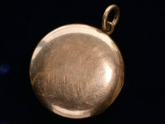 thumbnail of c1900 Rose Gold Filled Crescent Locket with Red and White Paste (reverse side on black background)
