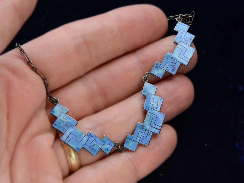 Detail of c1920 Cornflower Blue and Green Enamel Necklace (on hand for scale)