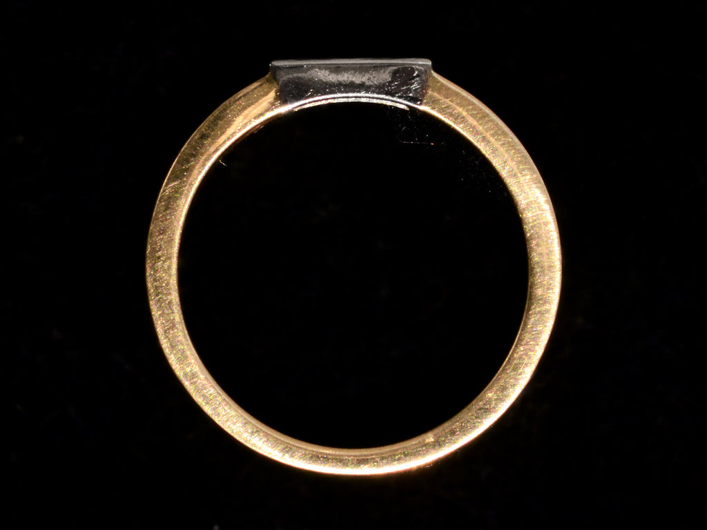 EB 0.19ct Tapered Diamond Baguette Ring in Yellow Gold and Platinum (side profile on black background)