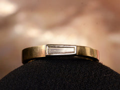 thumbnail of EB 0.19ct Tapered Diamond Baguette Ring in Yellow Gold and Platinum (front view on black and tan background)