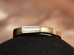 thumbnail of EB 0.19ct Tapered Diamond Baguette Ring in Yellow Gold and Platinum (left angle view on tan background)