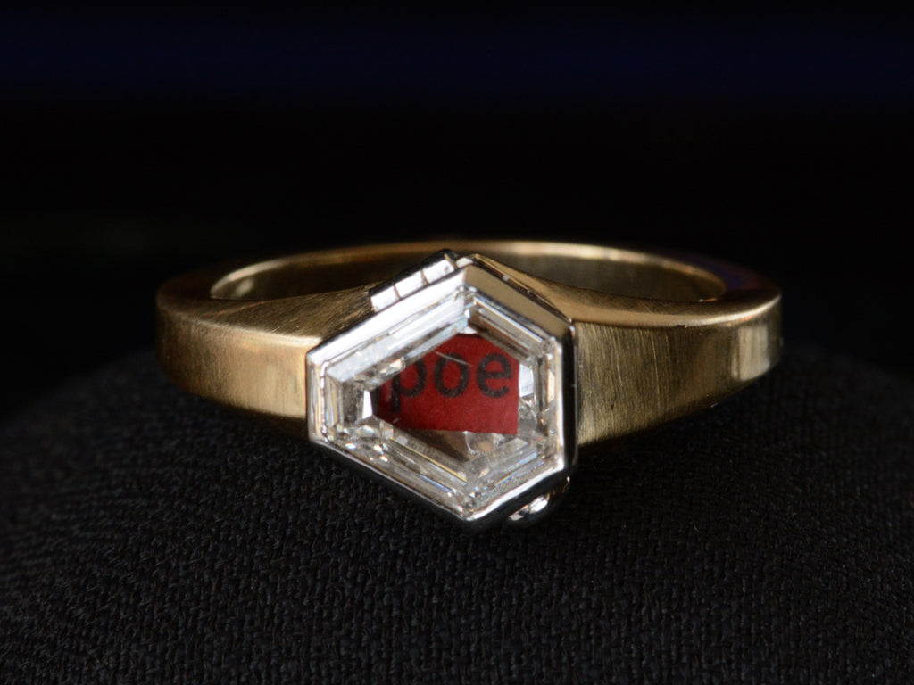 EB Diamond Locket Ring (on dark background with red paper in locket)
