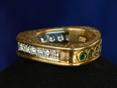 thumbnail of Side view of c1970 Emerald & Diamond Ring in Yellow and White Gold (shown on dark background)