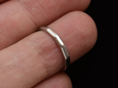 thumbnail of c1940 Faceted Platinum Band (on finger for scale)