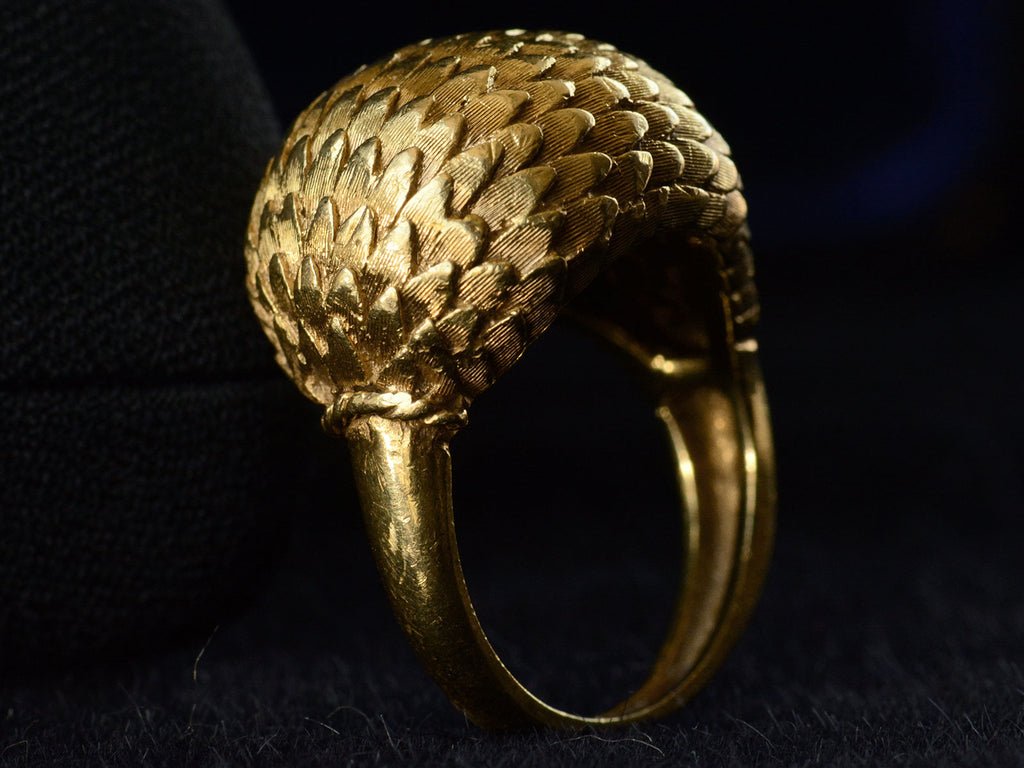 Angled side profile of c1980 Feathered Yellow Gold Dome Ring (on black background)