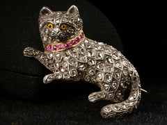 thumbnail of Front view of c1880 Pet Cat Brooch with Diamond and Rubies (shown against a jewelry box)