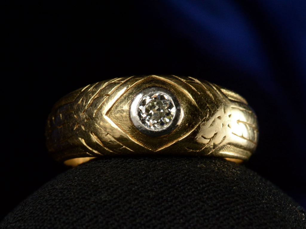 Front view of c1920 French Art Deco Diamond Ring in Yellow Gold (shown on dark background)