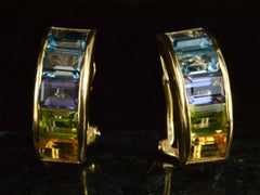 thumbnail of Front of vintage c1990 Yellow Gold Earrings with Zircon, Aquamarine, Tanzanite, Peridot and Citrine Set in an Arching Form (Shown on dark background)
