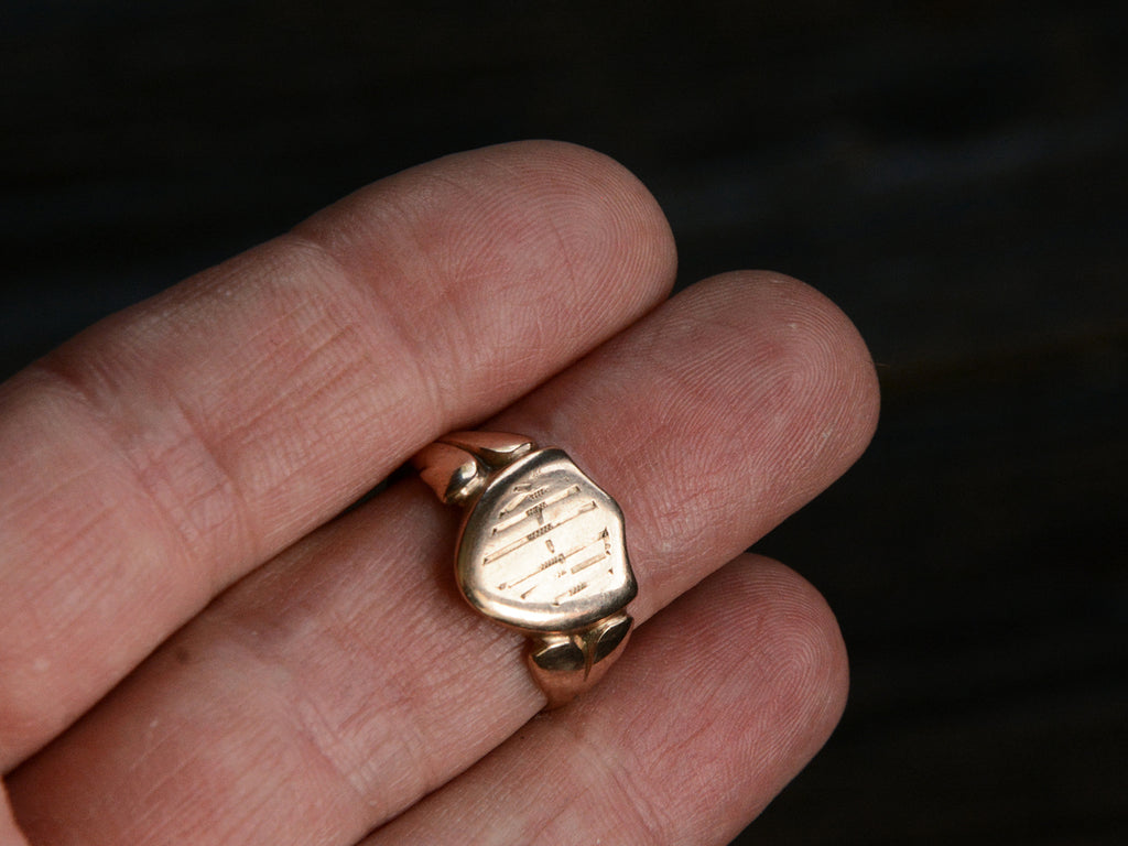 1918 Shield Signet Ring (on hand for scale)
