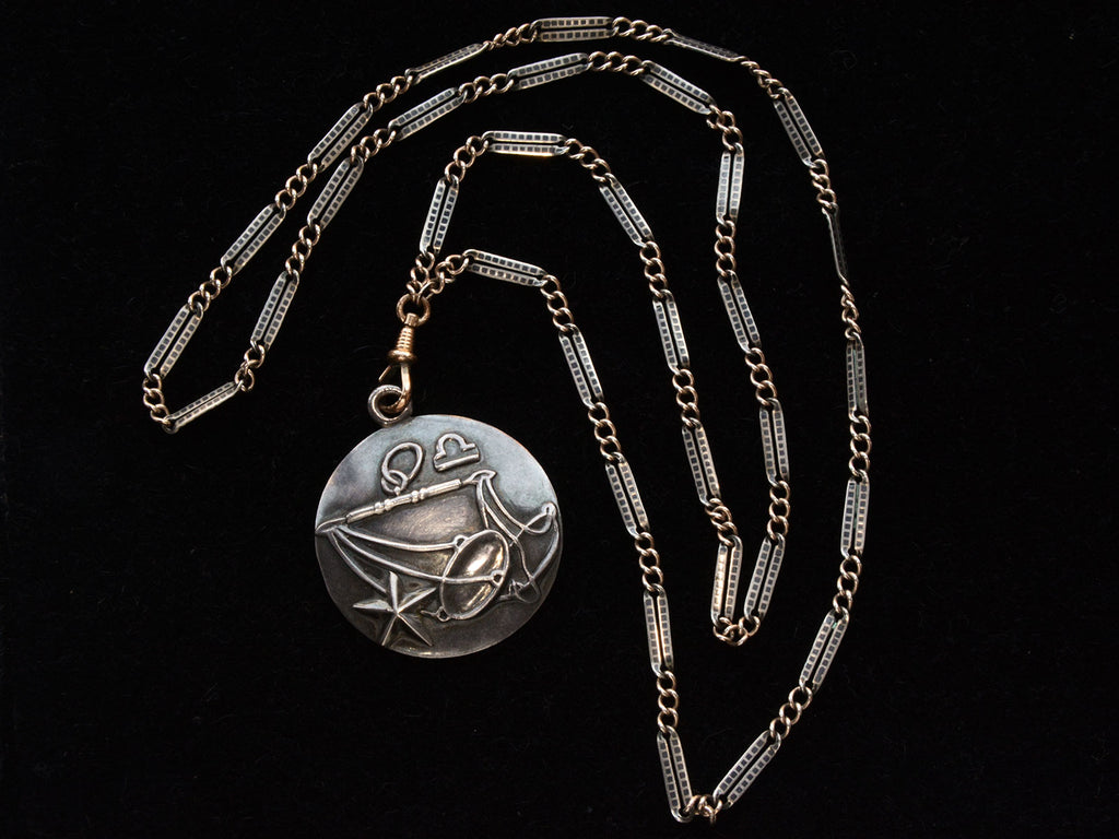 Vintage Margot de Taxco Silver Libra Pendant with Scales on Long Niello Chain (on black background)