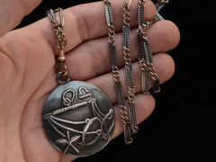 thumbnail of Vintage Margot de Taxco Silver Libra Pendant with Scales on Long Niello Chain (on hand for scale)