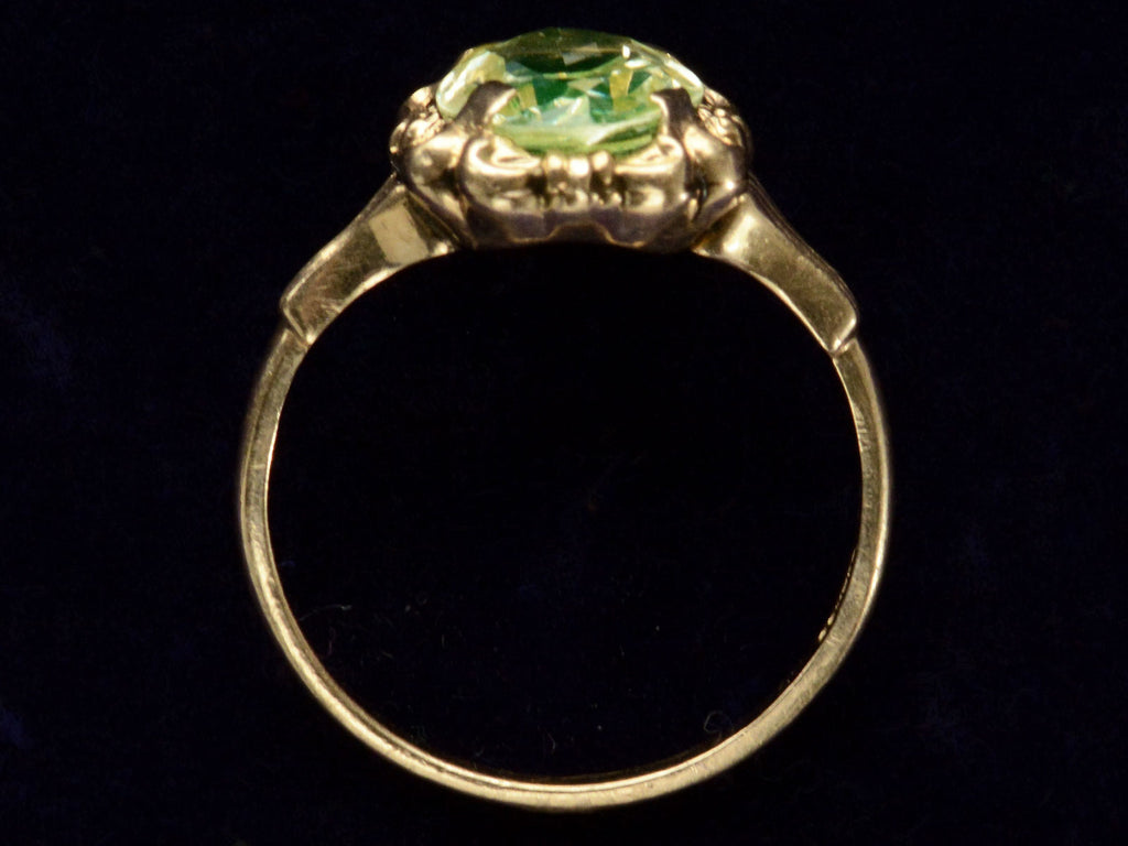 Side profile of c1930 Art Deco Marquise Shaped Uranium Glass Yellow Gold Ring (shown on dark background)