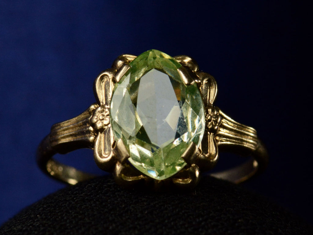 Front profile of c1930 Art Deco Marquise Shaped Uranium Glass Yellow Gold Ring (shown on dark background)