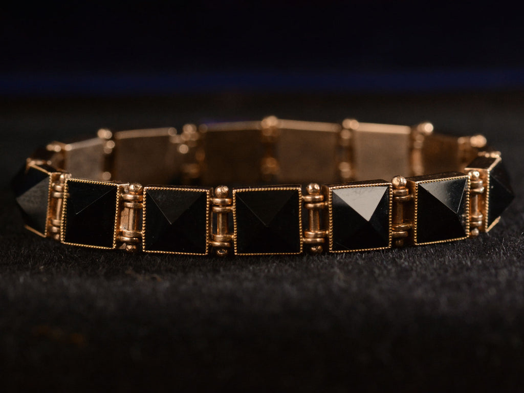 Face-on view c1890 Pyramidal Onyx and Rose Gold Bracelet (shown on black background)