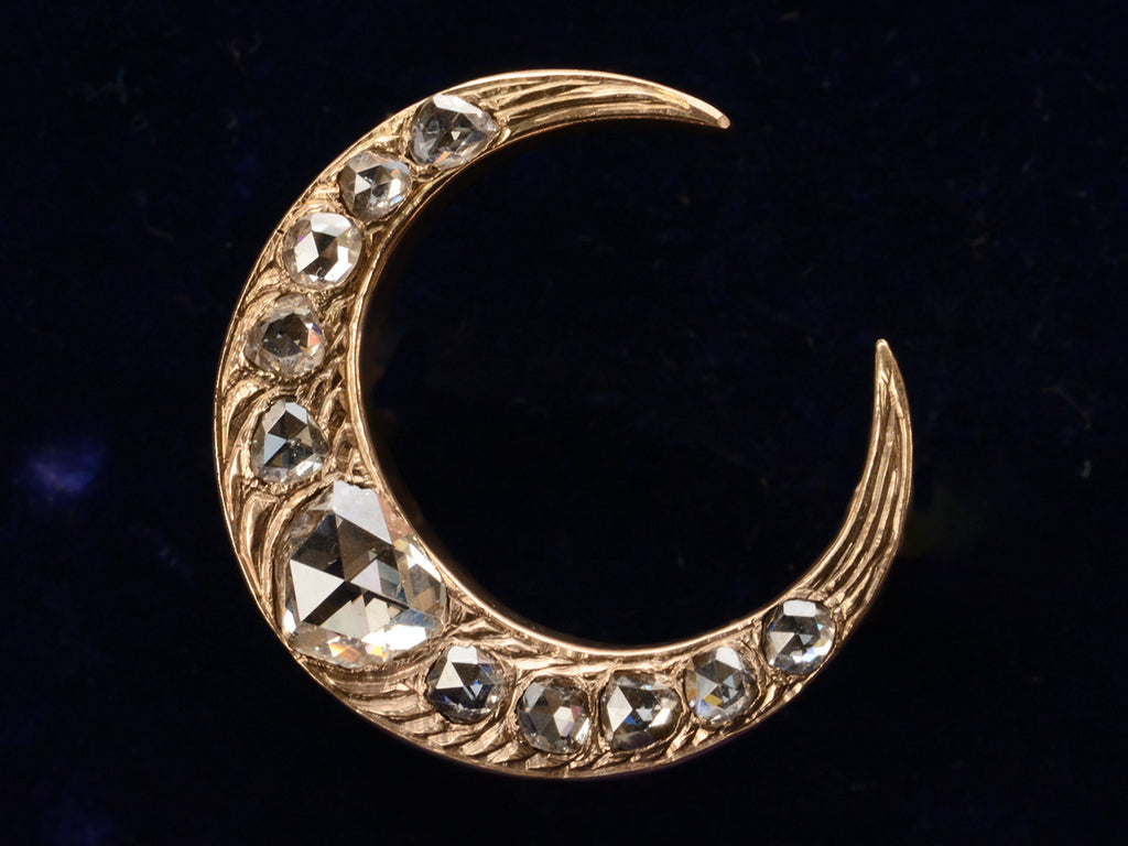 c1890 Rose Cut Diamond Crescent Brooch in Rose Gold (on dark blue background)