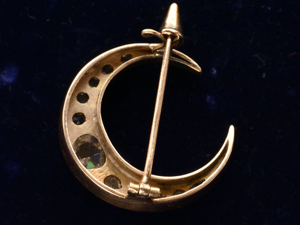 c1890 Rose Cut Diamond Crescent Brooch in Rose Gold (reverse side on dark blue background)