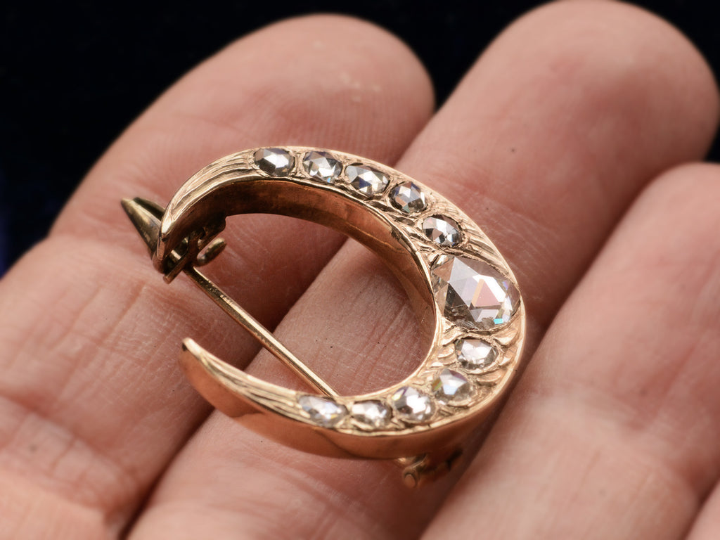 c1890 Rose Cut Diamond Crescent Brooch in Rose Gold (on hand for scale showing side angle)