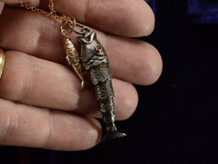 thumbnail of 1960s Double Fish Necklace (on hand for scale)