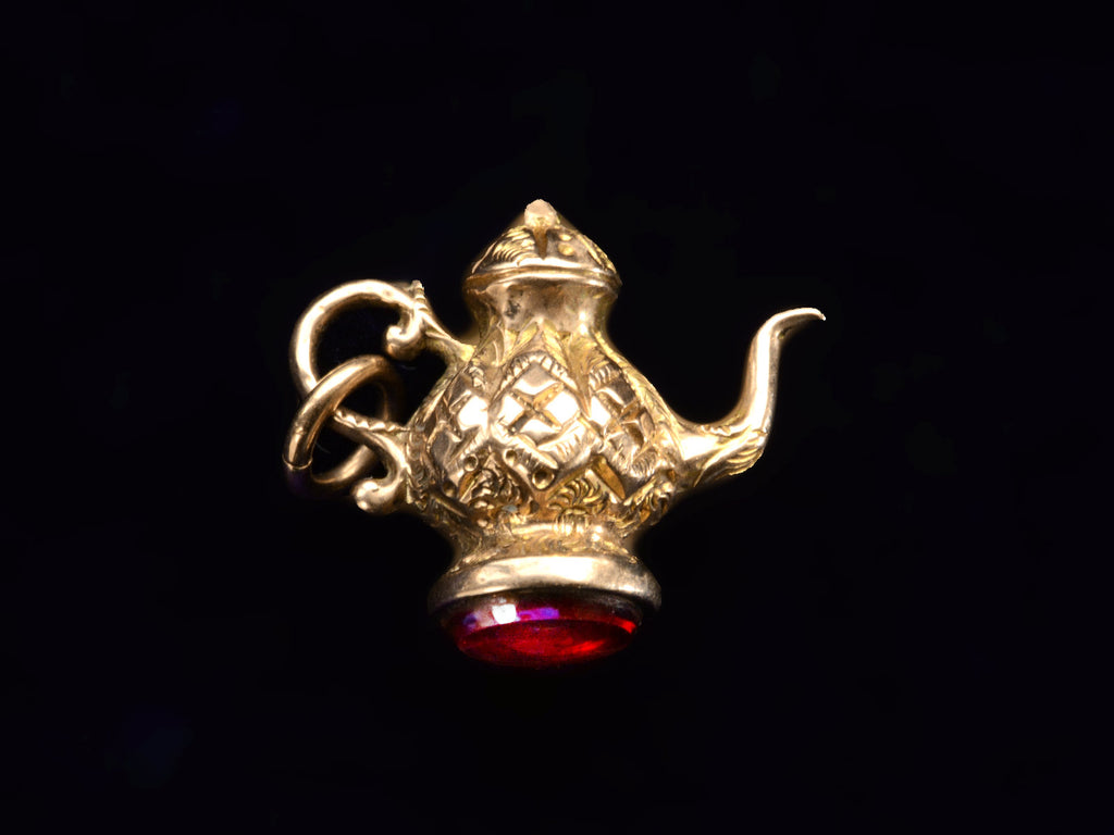 c1890 Gold Teapot Charm (on black background)