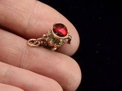 thumbnail of c1890 Gold Teapot Charm (on hand for scale)