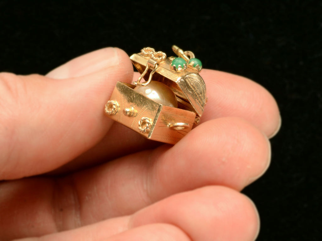 c1970 Treasure Chest Charm (shown open side view on hand for scale)