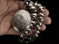 1881 Locket & Bookchain (on hand for scale)