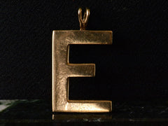 thumbnail of Vintage Gold Letter E Pendant (on black background)
