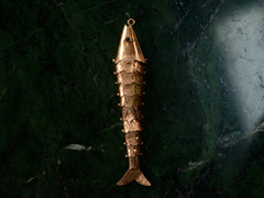thumbnail of Vintage Articulated Fish Pendant (on black background)