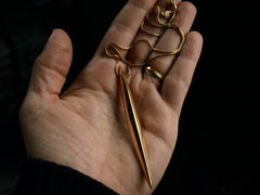 thumbnail of Movado Spike Necklace (on hand for scale)