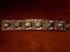 thumbnail of 1890s Egyptian Revival Scarab Bracelet (on red background)