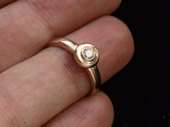 thumbnail of c1960 0.10ct Bezel Ring (on finger for scale)