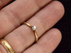 thumbnail of Front view of c1900 0.19ct Diamond Solitaire (on hand for scale)