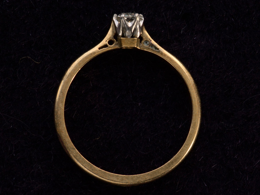 Side profile view of c1900 0.19ct Diamond Solitaire (on dark background)