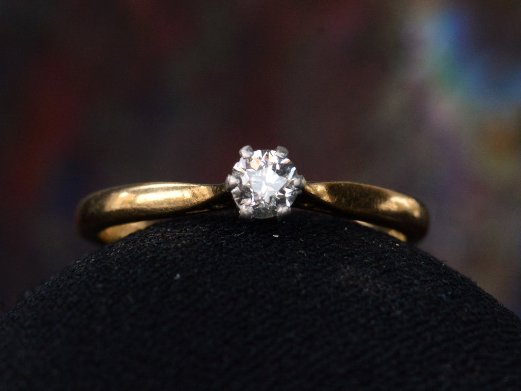 Front view of c1900 0.19ct Diamond Solitaire (on dark background)