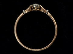 thumbnail of Side profile of an antique Art Deco era yellow and white gold engagement ring with a bezel-set round 0.20ct old European cut diamond. Shown on black background.