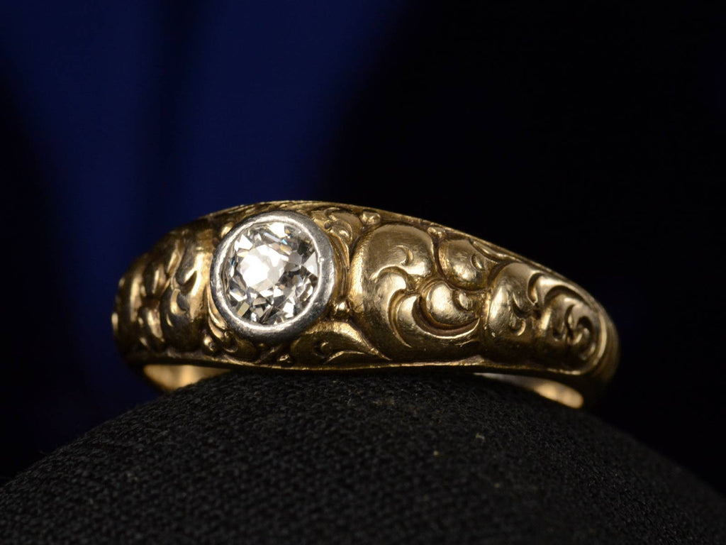 Right angle view of c1900 0.40ct Diamond Yellow Gold Ring (shown on black background)