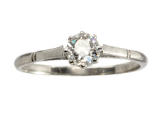 thumbnail of A simple 1920 solitaire engagement ring with a old European cut diamond set in 18K white gold, shown on white background.