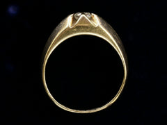 thumbnail of Side profile of wide antique men's ring with cushion shaped old cut white diamonds set in yellow gold, shown on dark background.