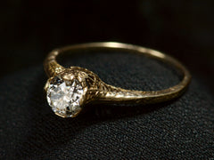thumbnail of Elevated view of c1920 Art Deco yellow gold engagement ring with a 0.64ct round diamond (on dark background)