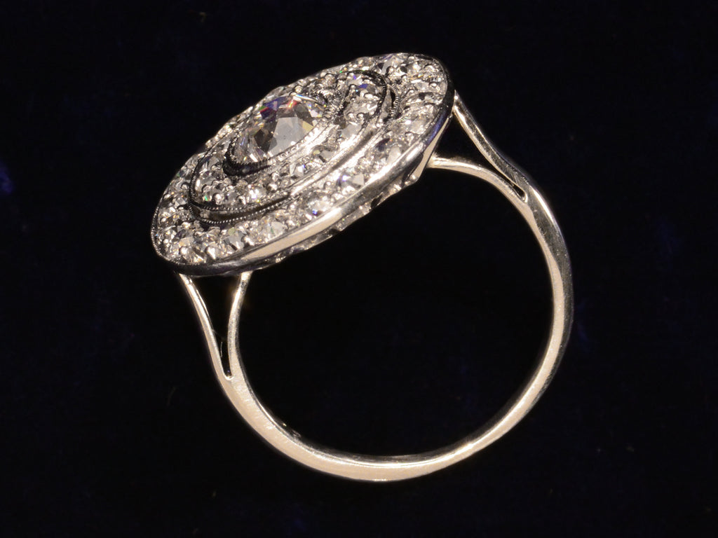 c1920 Art Deco Diamond Cluster Ring (side profile view on black background)