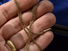 thumbnail of c1890 Victorian 10K Chain (shown on hand for scale)