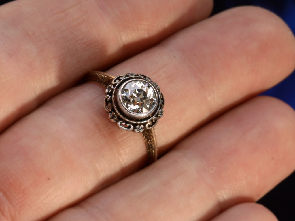 Front view of c1900 1.30ct Engagement Ring (shown on hand for scale)