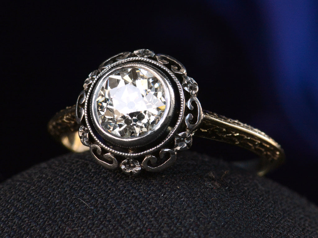 Right angled view of c1900 1.30ct Engagement Ring (shown on dark background)