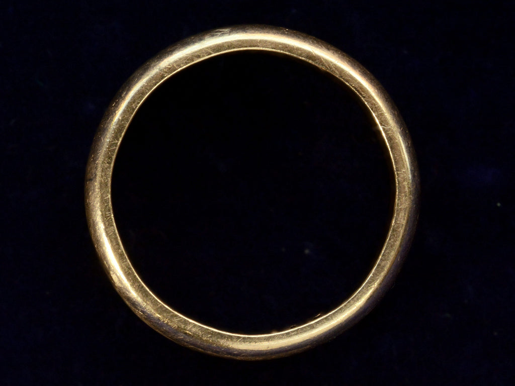 c1950 3.8mm 14K Yellow Gold Band (profile view on black background)