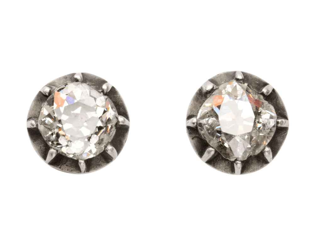 c1890 ~1.50cttw Old Mine Cut Diamond Studs in Silver Topped Collets (shown on white background)